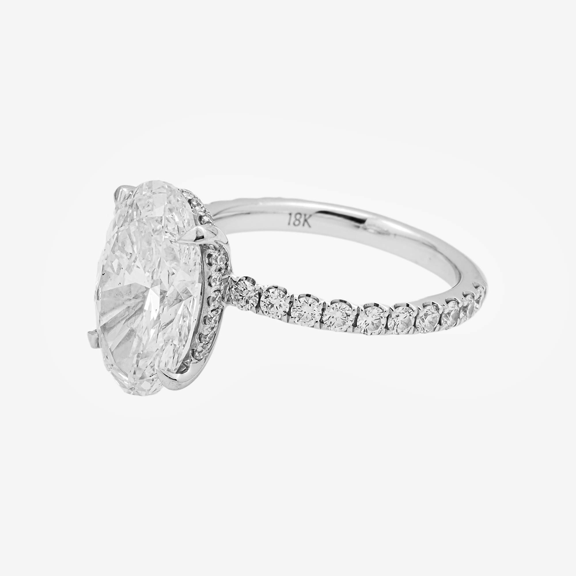 18K ROUND DIAMOND RING IN WG