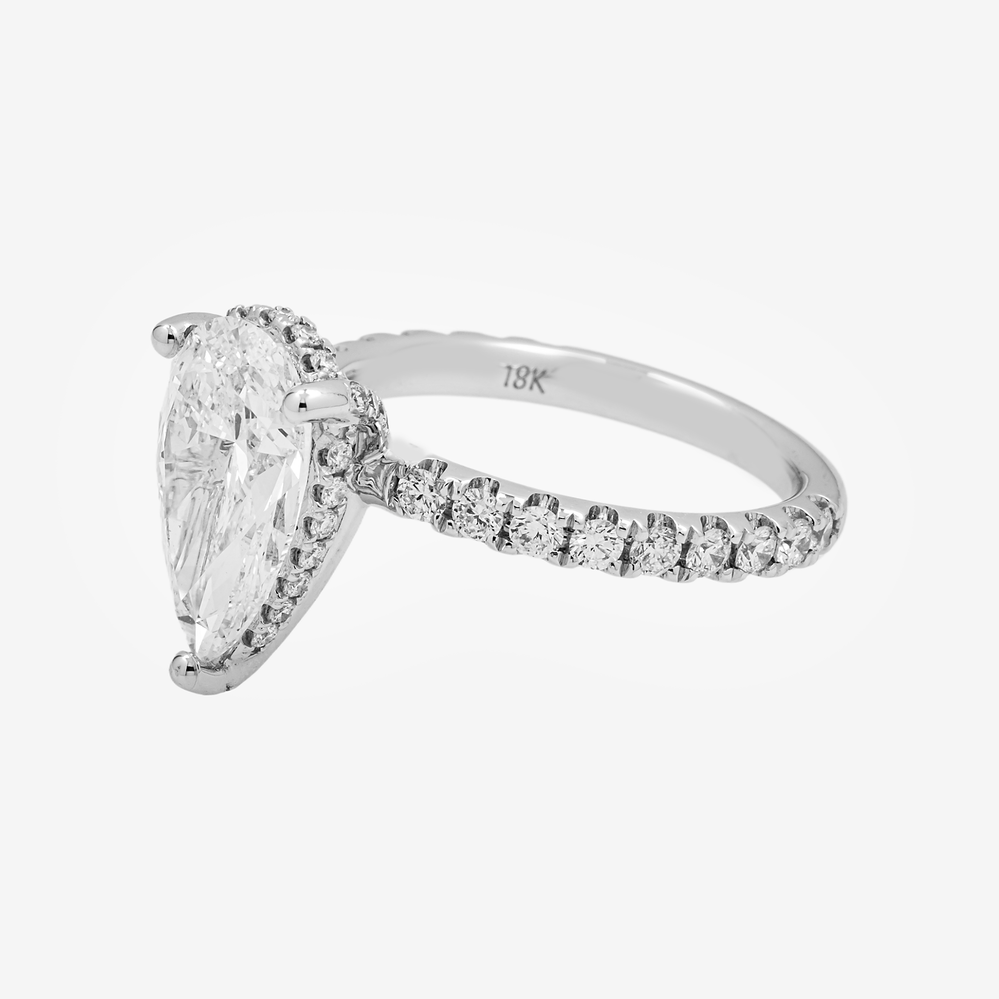 14K PEAR SHAPE DIAMOND RING IN WG