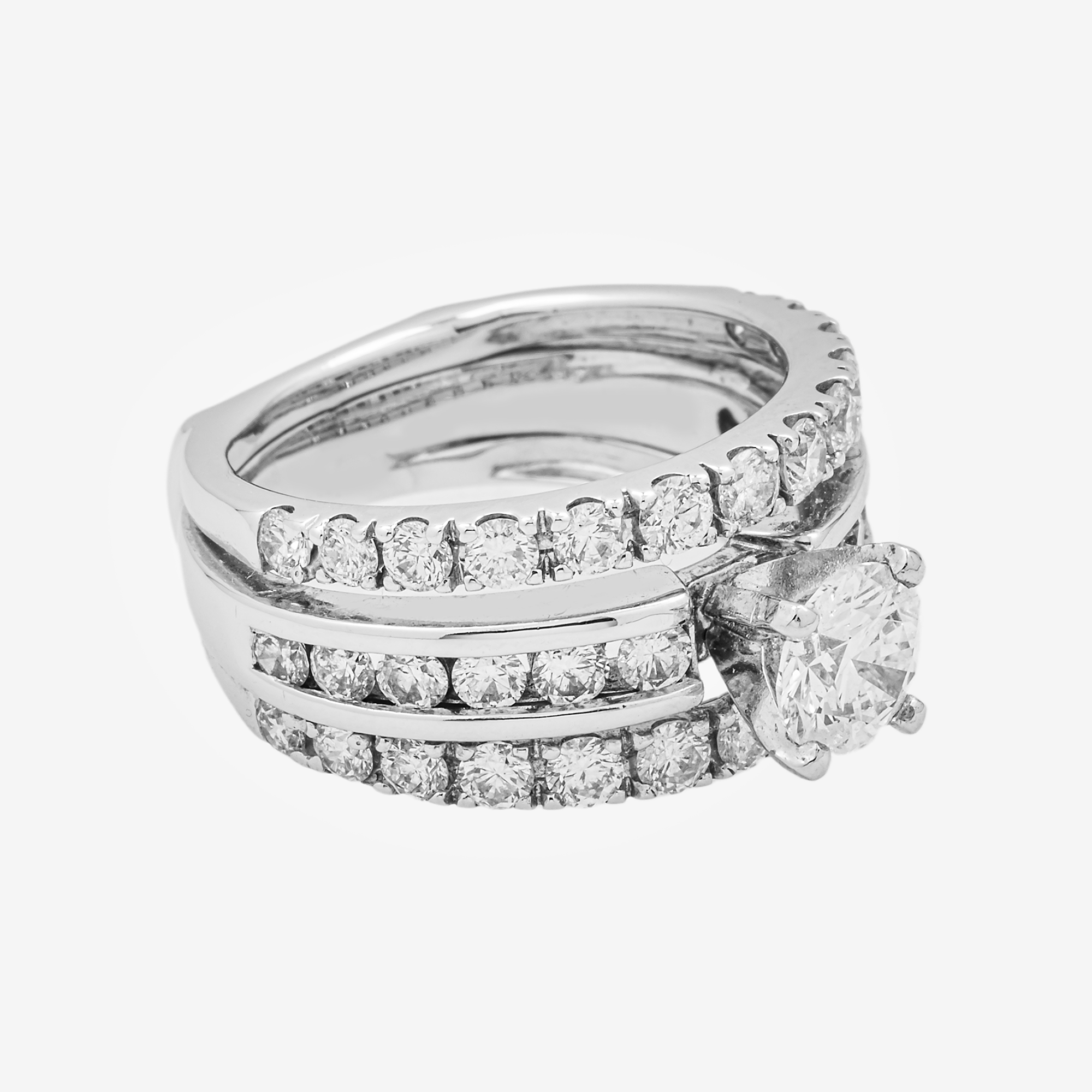 TRIPLE ROW ROUND CENTER DIAMOND RING IN WG