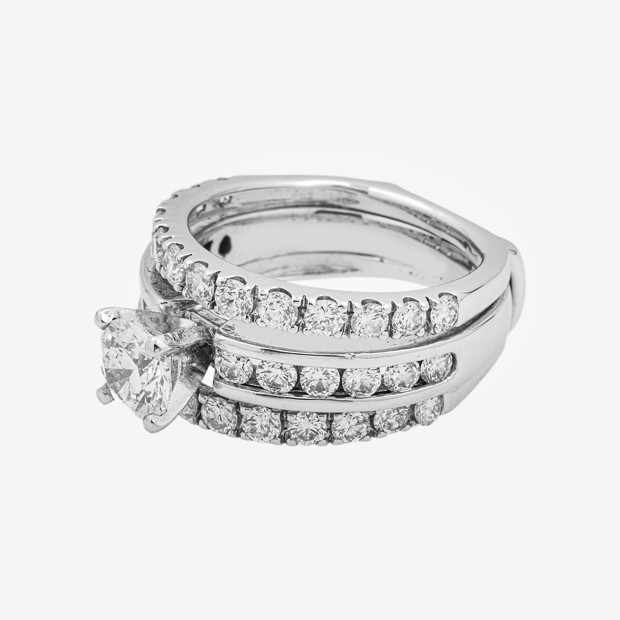 TRIPLE ROW ROUND CENTER DIAMOND RING IN WG
