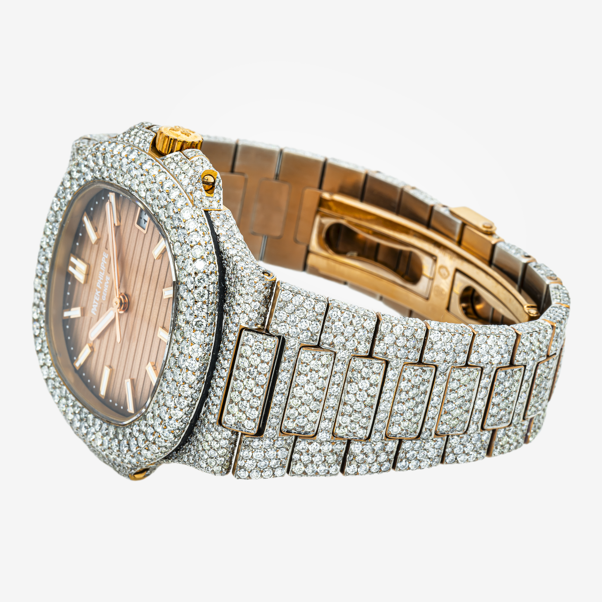 PATEK PHILIPPE NAUTILUS PEACH DIAL 5711 40MM WITH 22CT DIAMONDS