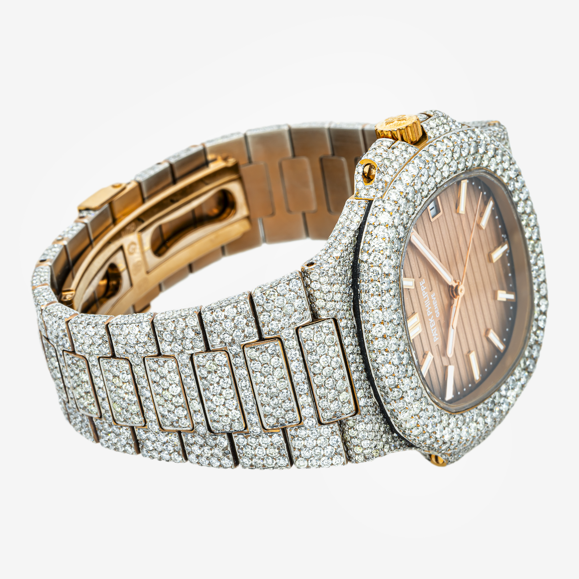 PATEK PHILIPPE NAUTILUS PEACH DIAL 5711 40MM WITH 22CT DIAMONDS