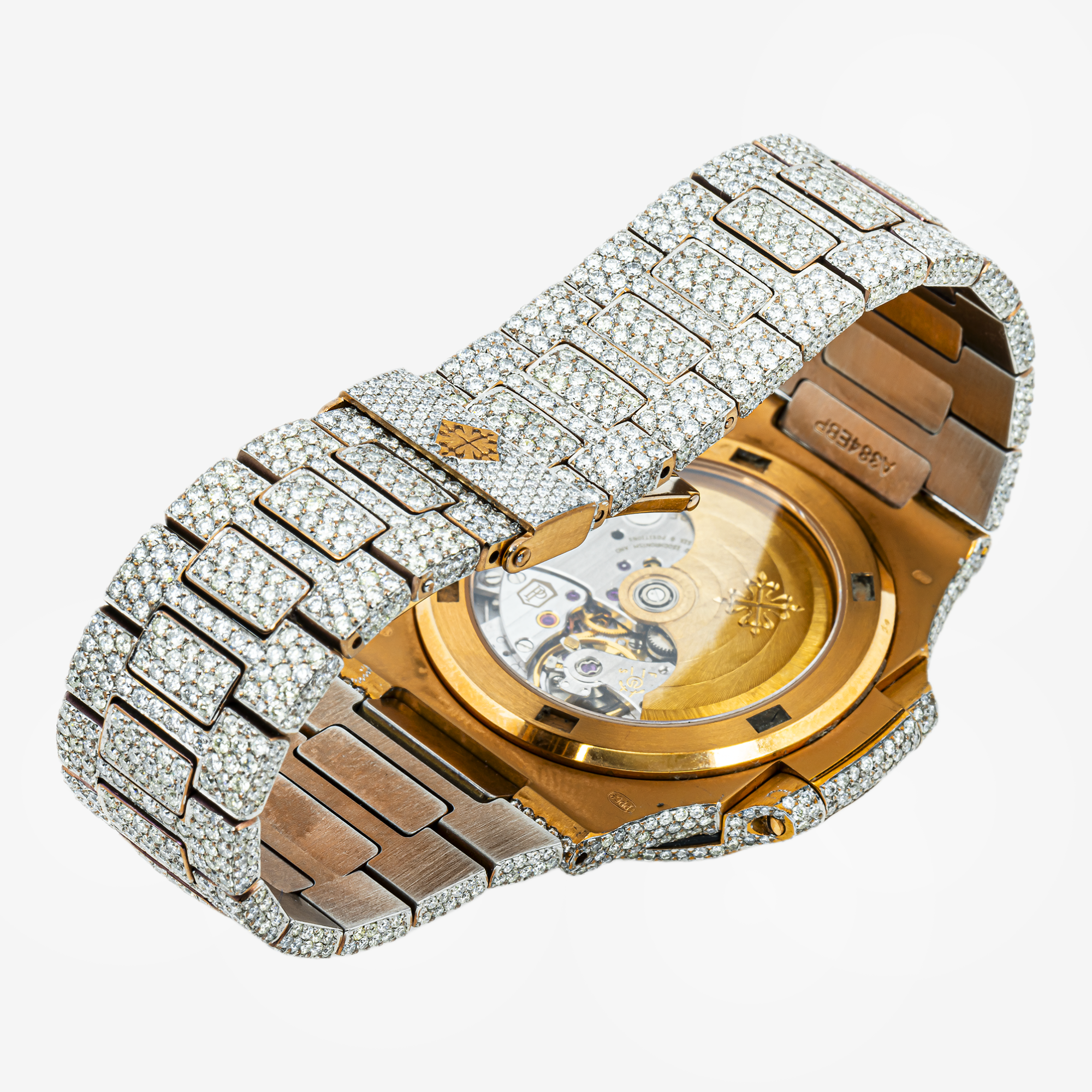 PATEK PHILIPPE NAUTILUS PEACH DIAL 5711 40MM WITH 22CT DIAMONDS