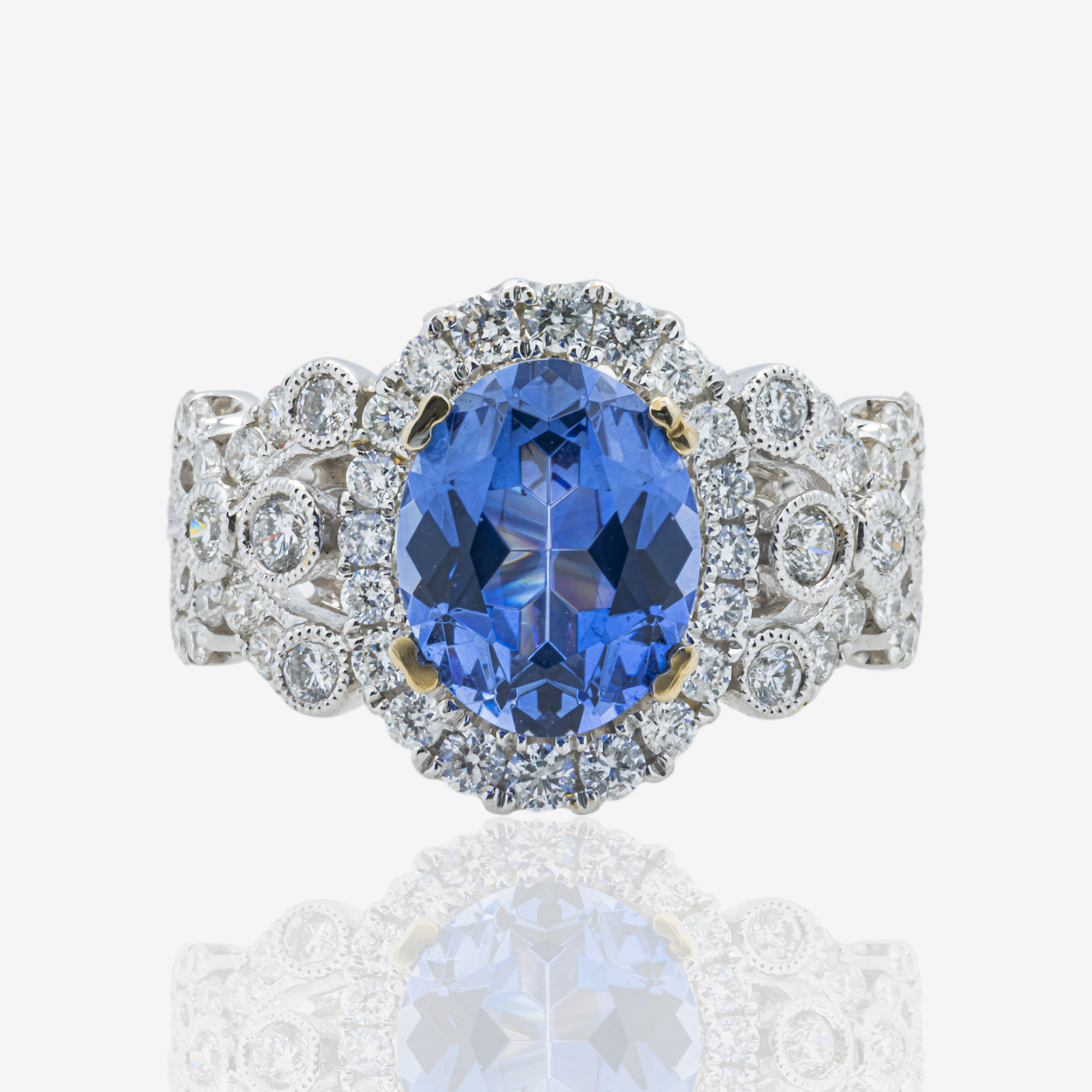 18K OVAL SAPPHIRE CENTER DIAMOND RING IN WG 1.2 CT DIAMONDS