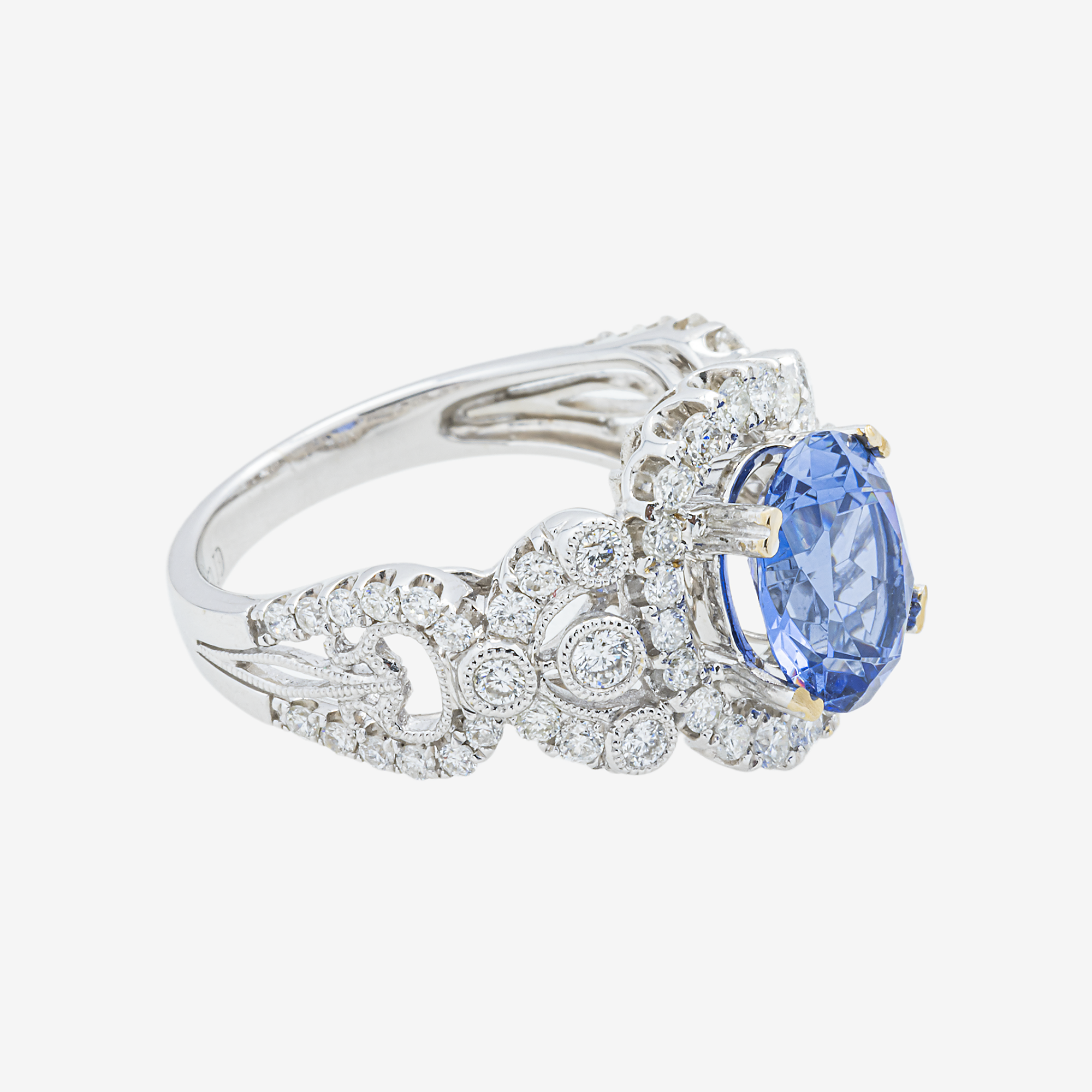 18K OVAL SAPPHIRE CENTER DIAMOND RING IN WG 1.2 CT DIAMONDS