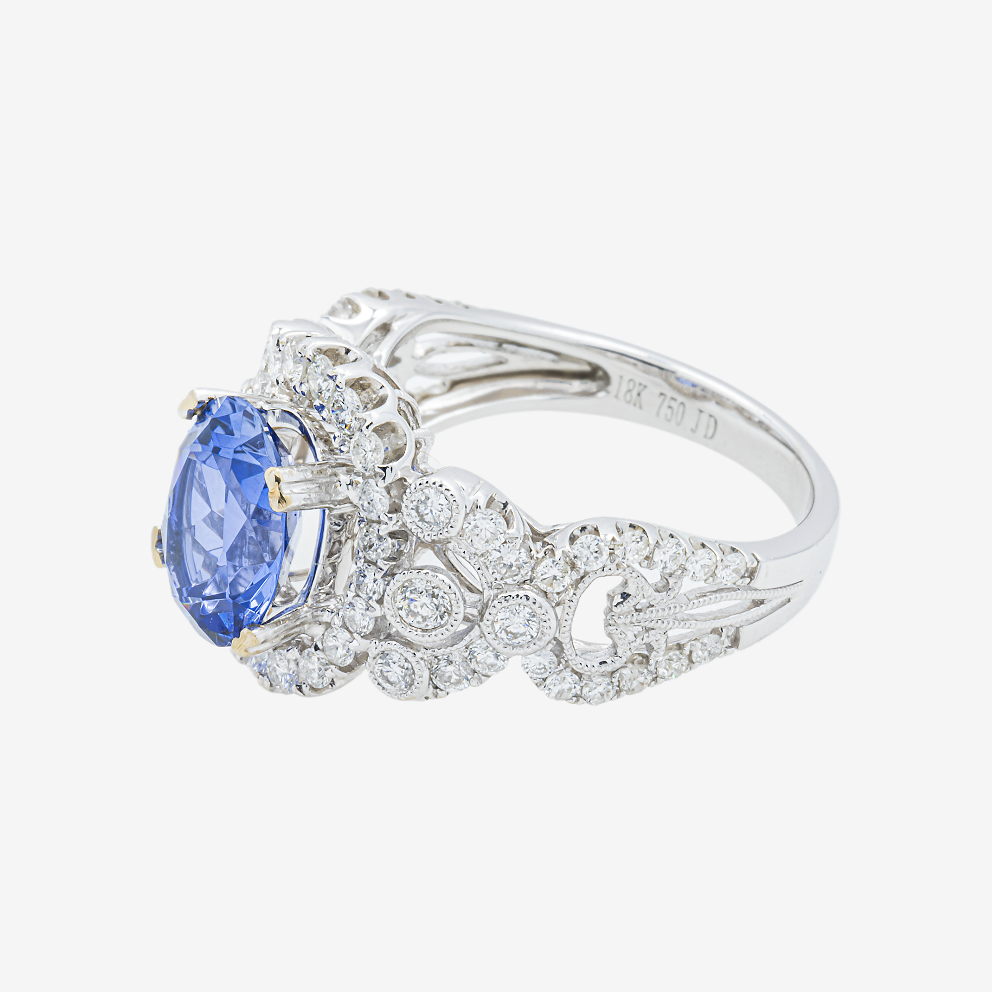 18K OVAL SAPPHIRE CENTER DIAMOND RING IN WG 1.2 CT DIAMONDS