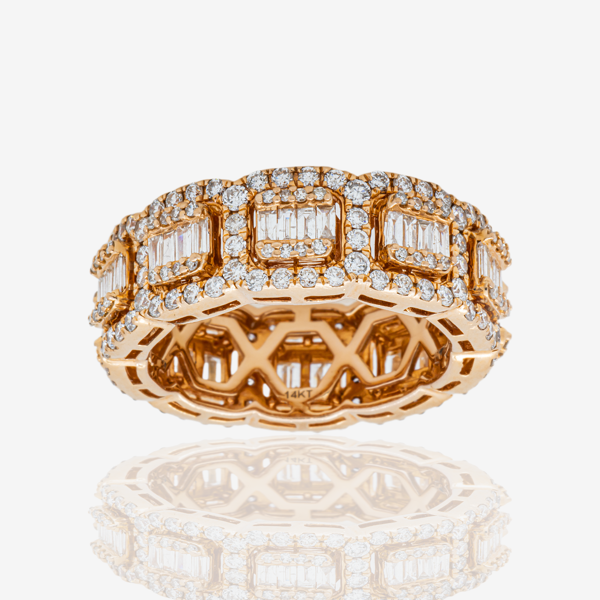 ROUND/BAGUETTE DIAMOND RING IN RG 5.6 CT DIAMONDS