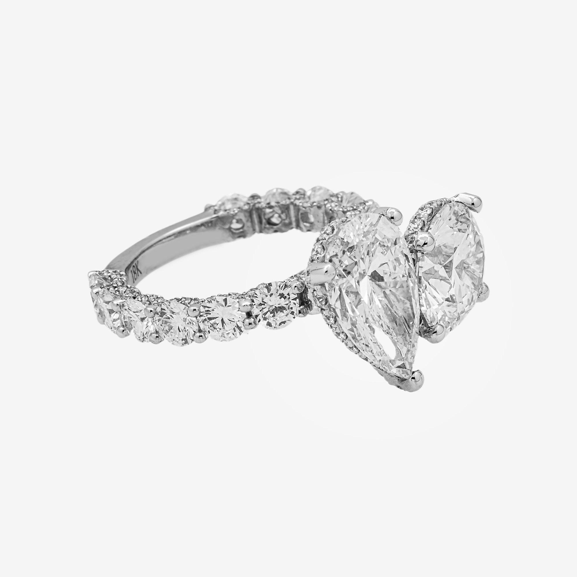 18K TWO-STONE PEAR SHAPED DIAMOND RING IN WG