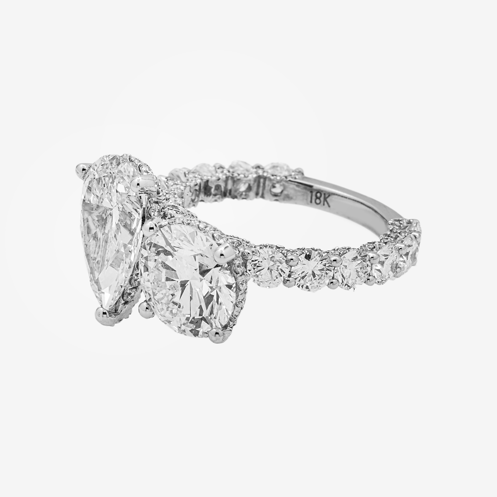 18K TWO-STONE PEAR SHAPED DIAMOND RING IN WG