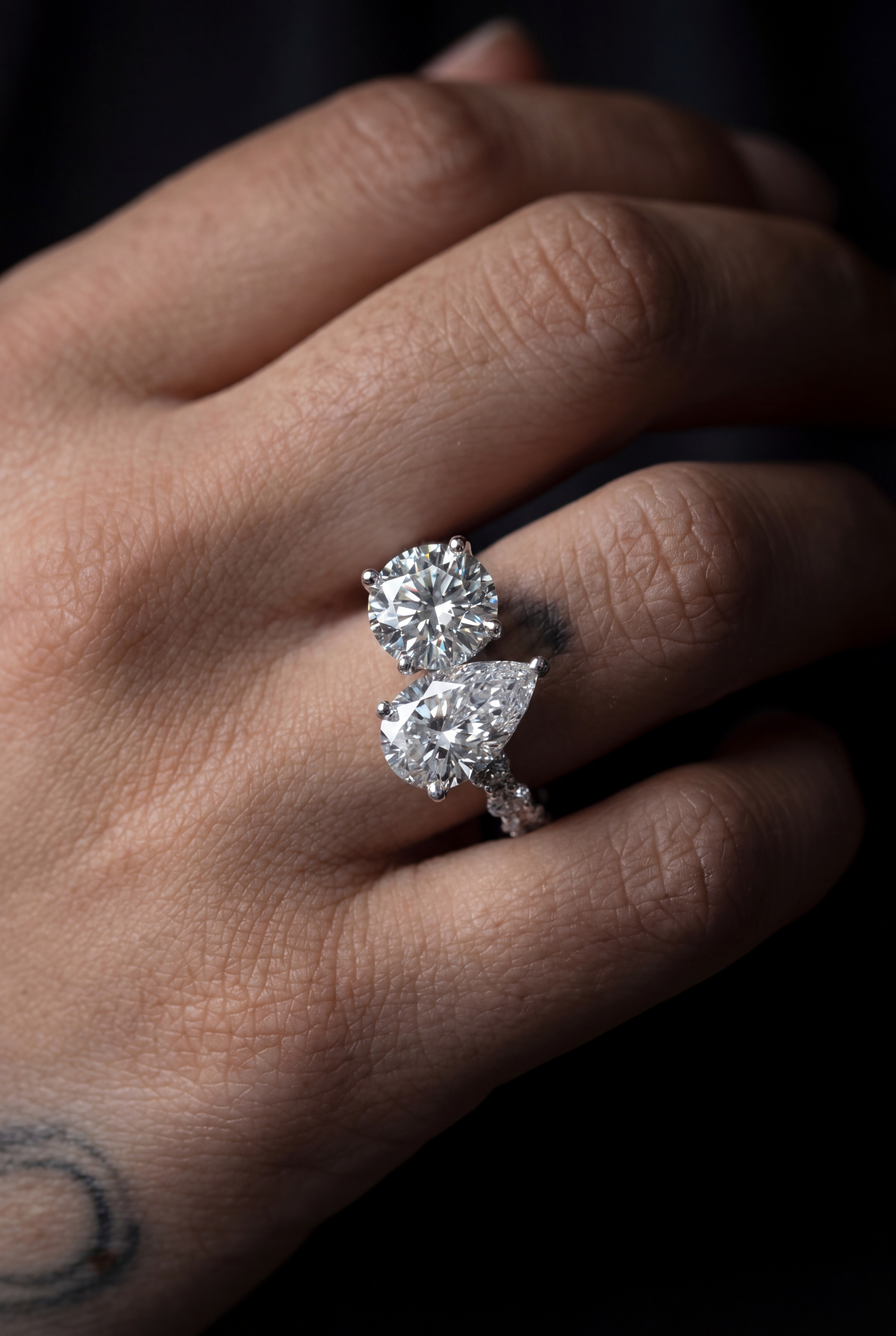 18K TWO-STONE PEAR SHAPED DIAMOND RING IN WG